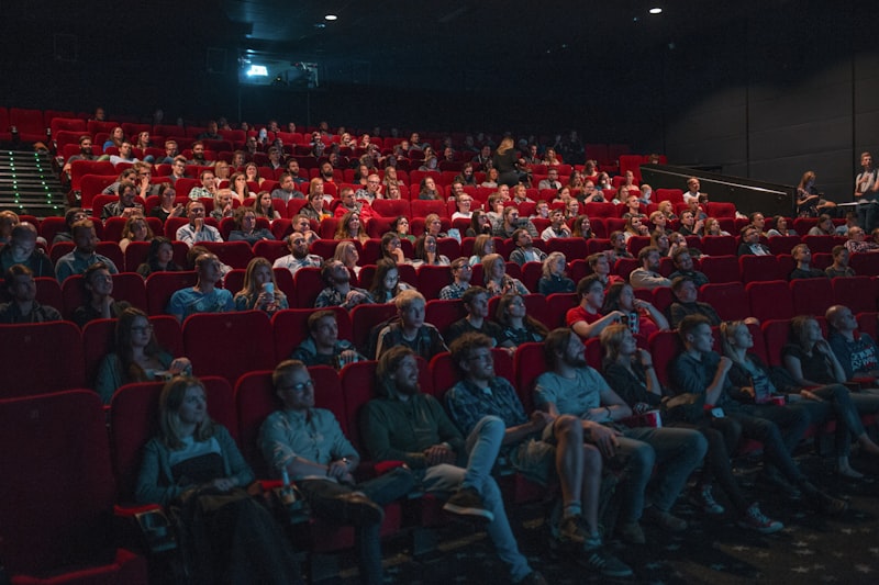 Captive audience watching premium video content in a cinema