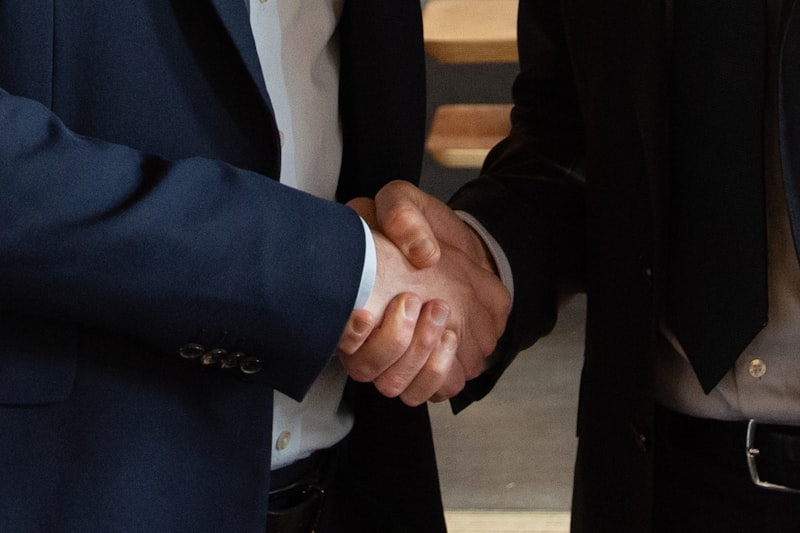 Business partnership handshake symbolizing flexible pricing agreements